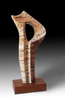 GEA # 2 by Juan Ramon Gimeno -  Ceramic Sculpture (2013)  Stoneware and porcelain colored with oxides or pigments.  Fired at 2300 ° F - 1260 ° C- cone 8  9.7/8"x 5. 1/8" x 20. 7/8" total height 23“ Wood stand (walnut) 5.7/8" x 9. 1/8" x 2. 1/8“