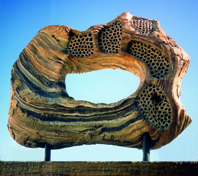  LEJOS DE CASA (away from home) by Juan Ramon Gimeno -  Sculpture (2006)  Ceramic: 16.11/16” x 23.5/8” x 7” wood 1.3/4” x 27.15/16” x 6” total height 25” 
